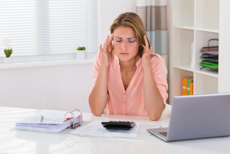 woman stressing over bills