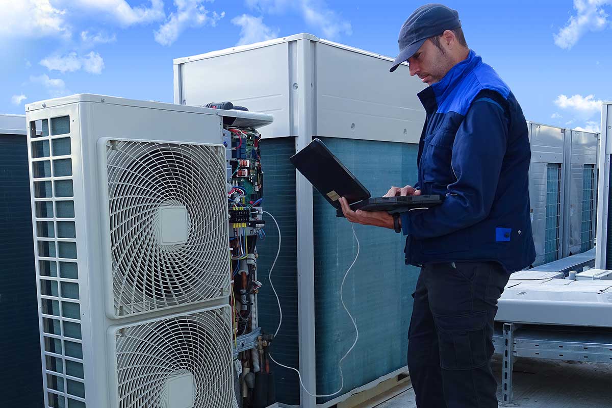 Tech working on Commercial ACs