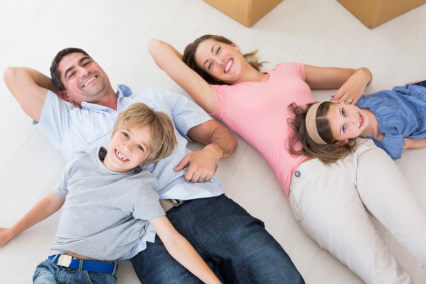 family laying on floor